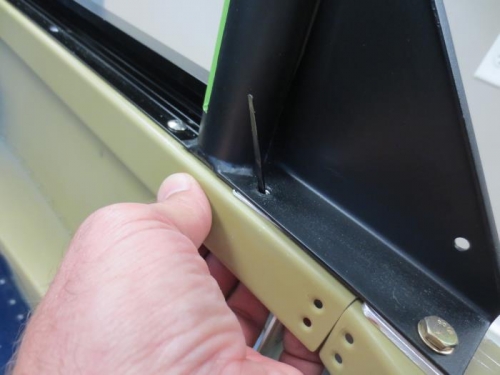 Pulled back down while holding parts