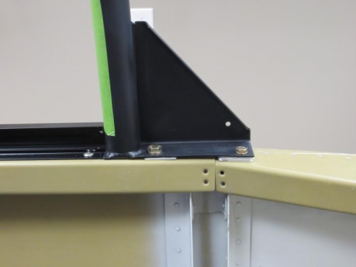 Shims under roll bar