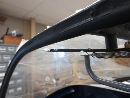 Slight bend on canopy latch