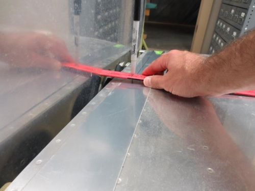 Sribing cut line on wing fairing