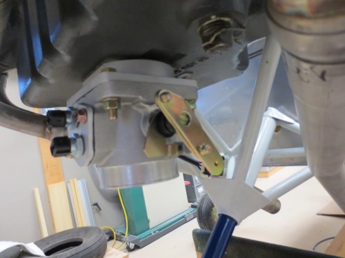 Throttle body with arm trimmed