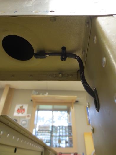 Rear nav light just inside vertical stabilizer