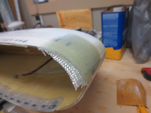 Fiberglass laid up to fill gap