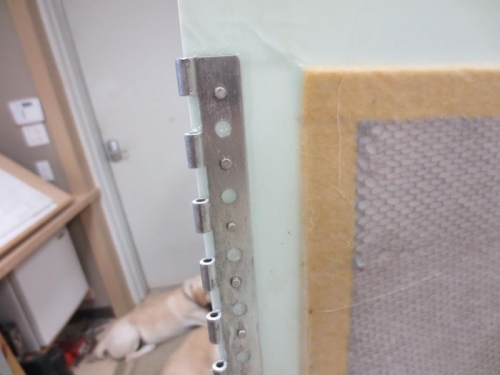 Hinge glassed and riveted