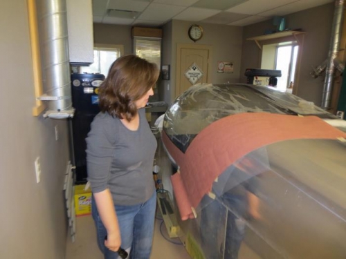 Yvonne looking at the work