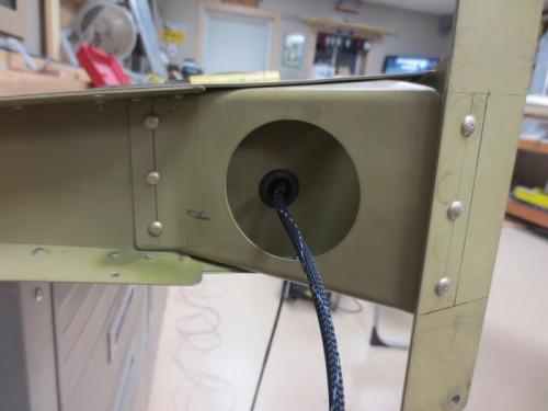 Position light wire in bottom of rudder