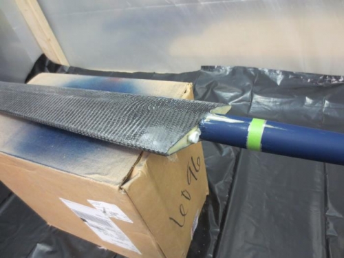 Trimmed carbon fiber on the left gear fairing