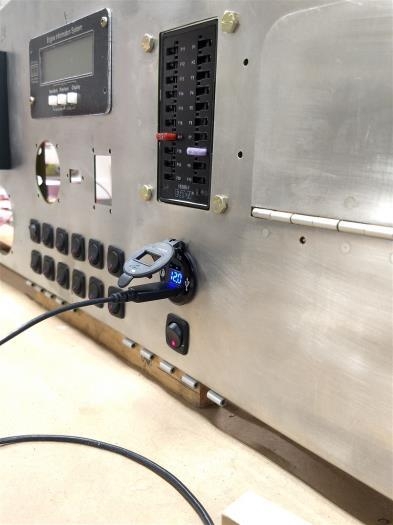 The USB port charging a phone