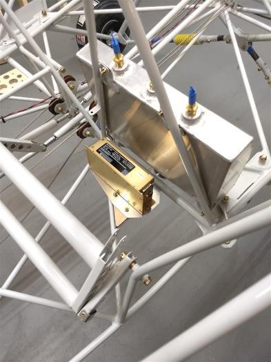 Transponder behind the header tank