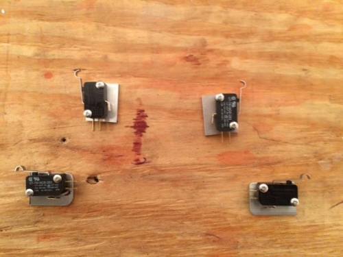Micro-switches mounted onto plates