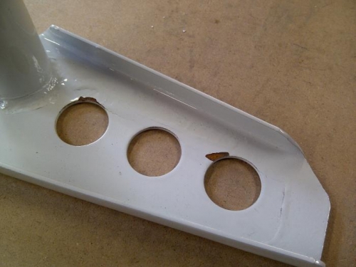 L. Control horn, chipped paint and surface rust evident