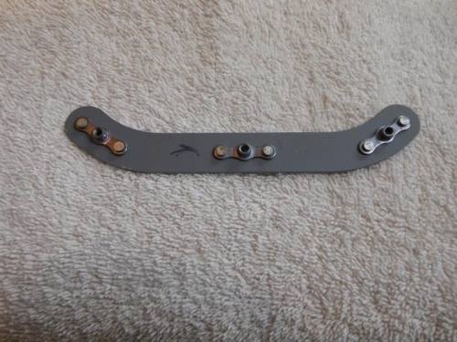 Retainer bracket ready for installation.