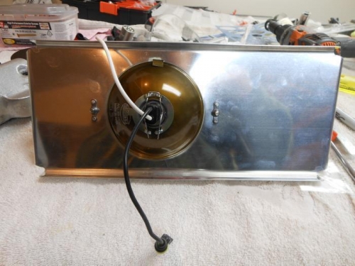 Taxi light mounted on reflector mount with plate nuts.