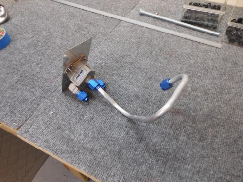 Fuel line to fuel filter.