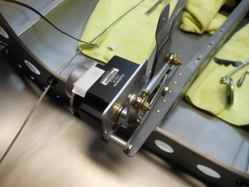 Servo mounted and drive arm attached to belcrank.