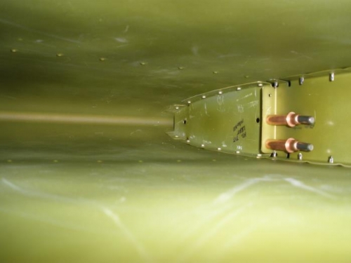 Middle forward rib riveted top and bottom. Middle aft rib cleco'd in place.