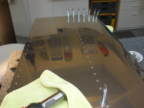 Forward Spar being riveted to skin.