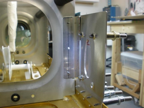 Angle brace attched to rib for support.