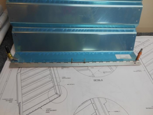 Lining up the rear seat hinge