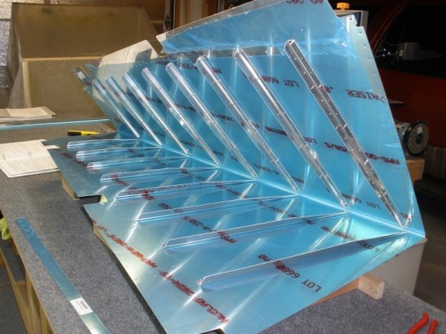 Stiffeners cleco'd into place on the rudder skin.