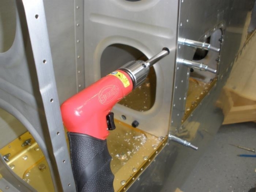 Drilling the holes in the wing ribs.