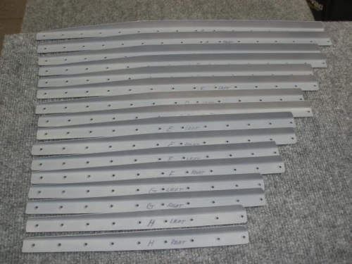 Rudder stiffeners dimpled and primed.