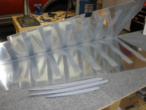 Rudder skin scuffed and primed.