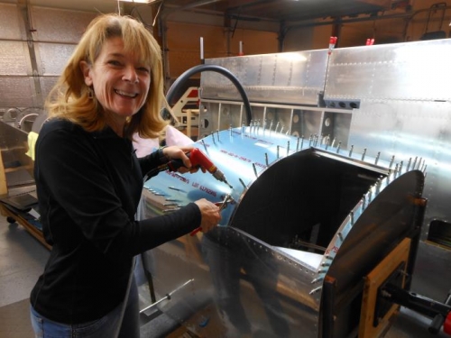 Terri match drilling the forward top skin.