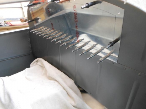 Hinge spacer match drilled to bulkhead.