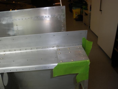 Prepping the bracket locations for primer.