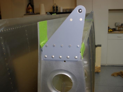 Placing the last 5 rivets in the rib.