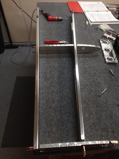 Clecoing the right side ribs and spars together.