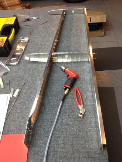 Drilling middle rib to spar attach holes