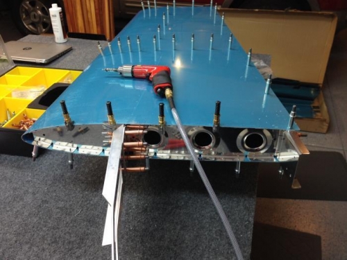 Sk;in in place, match drill inner rib to spar locations.