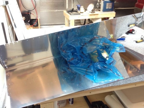 Inside protective vinyl removed.