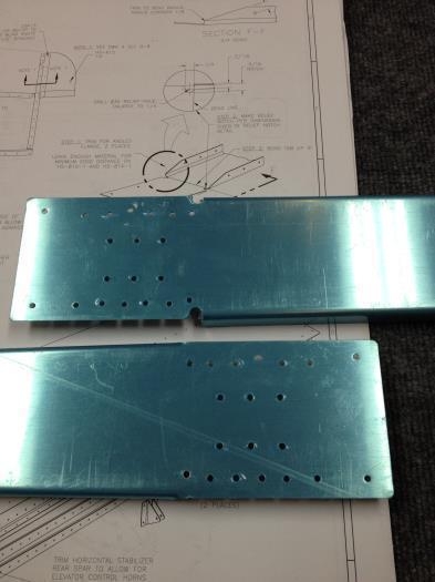 Forward spar channels after match drilling and bend relief holes.