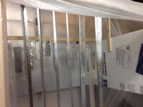 All parts hanging and fitted into the small paint booth.