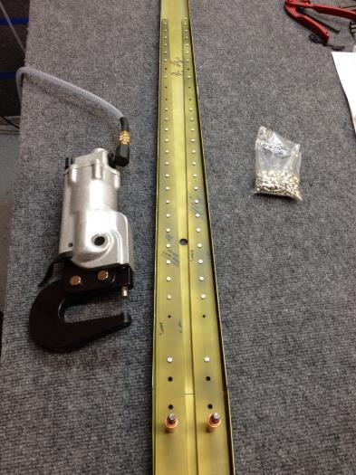 Rear HS rear spar and the two reinforcement bars being viveted with pneumatic squeezer.