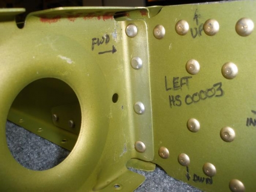Left rear inboard rib riveted to forward spar.