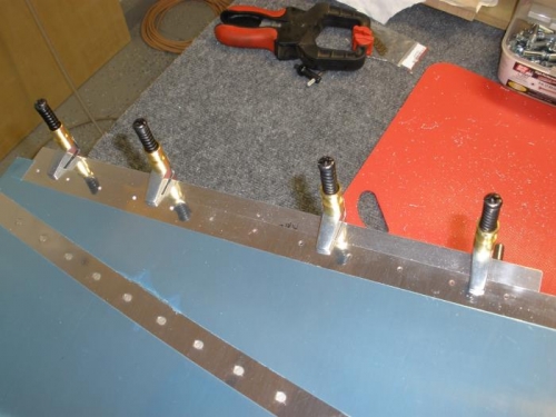 Rudder bottom attach strips clamped.