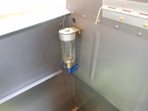 Brake fluid Reservoir in forward baggage compartment.