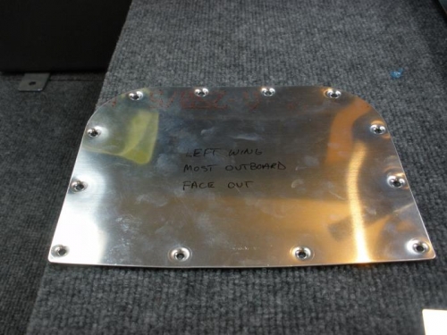 Inspection cover drilled and dimpled.