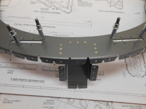 Canopy rail receptacle fiarleads riveted.