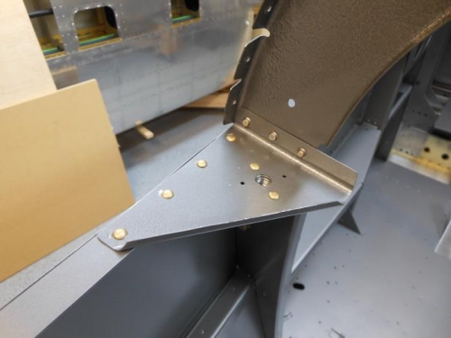 Gussets riveted in place.