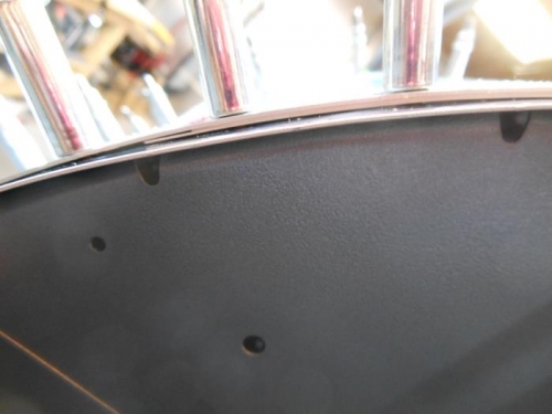 Shim under forward upper skin.