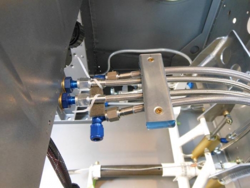 Clamp structure to hold brake lines secure.