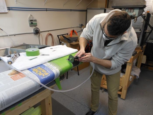 Trimming with a cutting wheel on a die grinder.