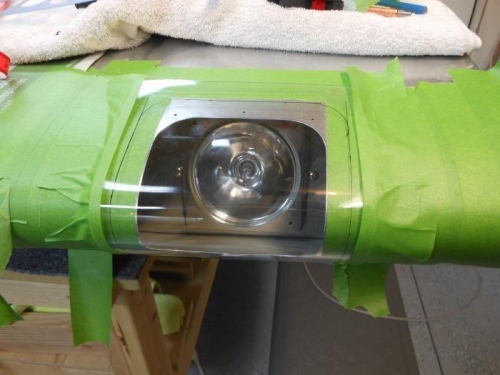 Marking the lense for trimming.