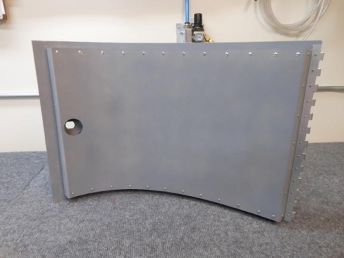 Inner door skin riveted with blind rivets.