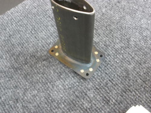 Plate nuts riveted to Pitot Mast.